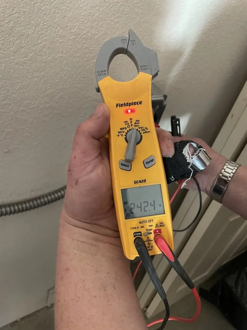 Voltage testing with clamp meter during Generator Installation in Duxbury